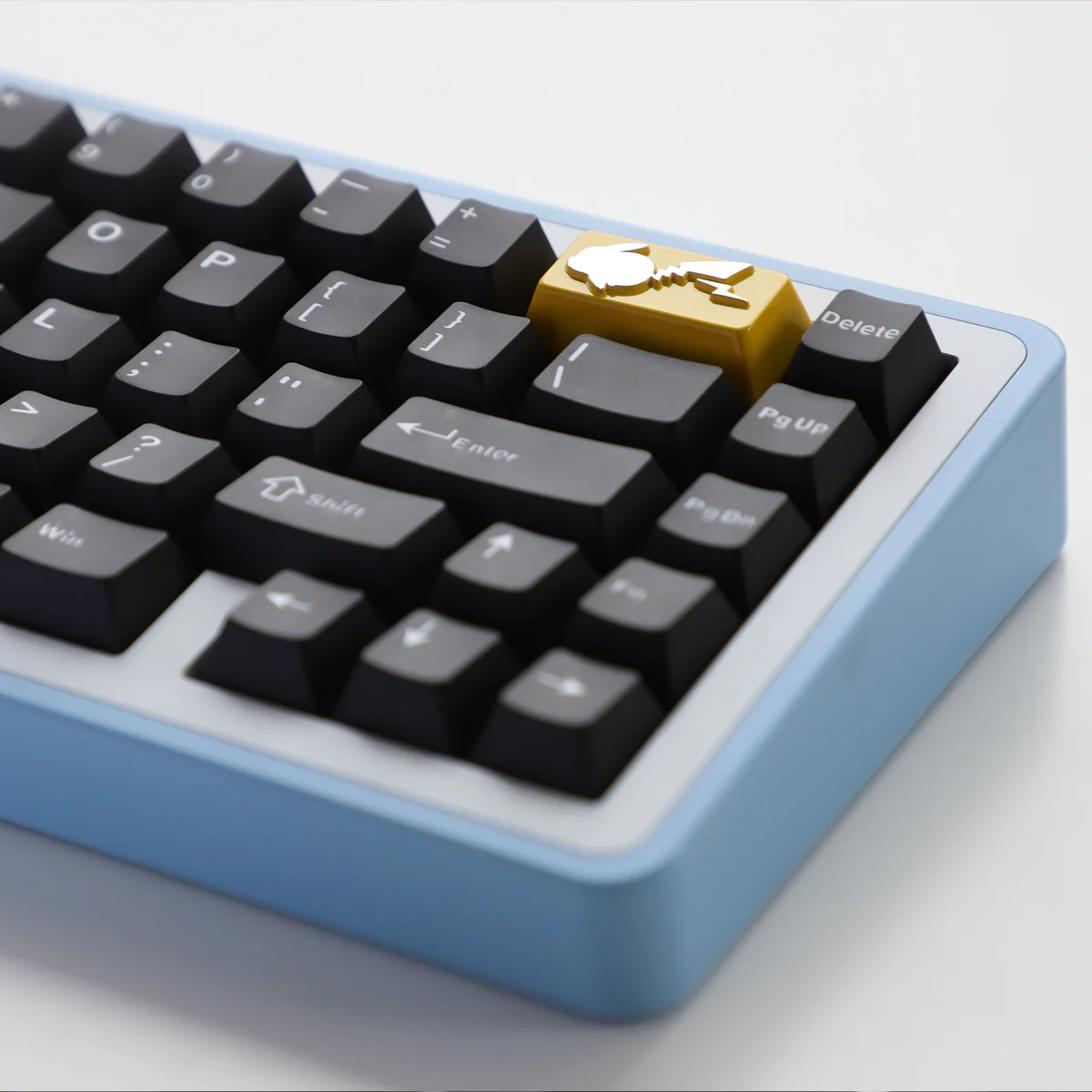 Side view of Pikachu keycap showing profile