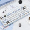 Keyboard with Pixel Cat keycaps in a clean setup