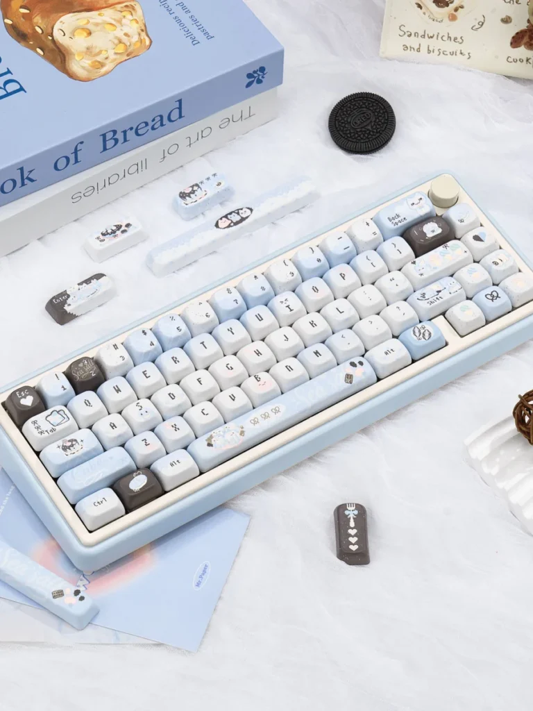 Keyboard with Pixel Cat keycaps in a clean setup