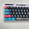 Angled view of the Pixel Video Games Keycap Set, highlighting the Cherry profile and PBT texture.