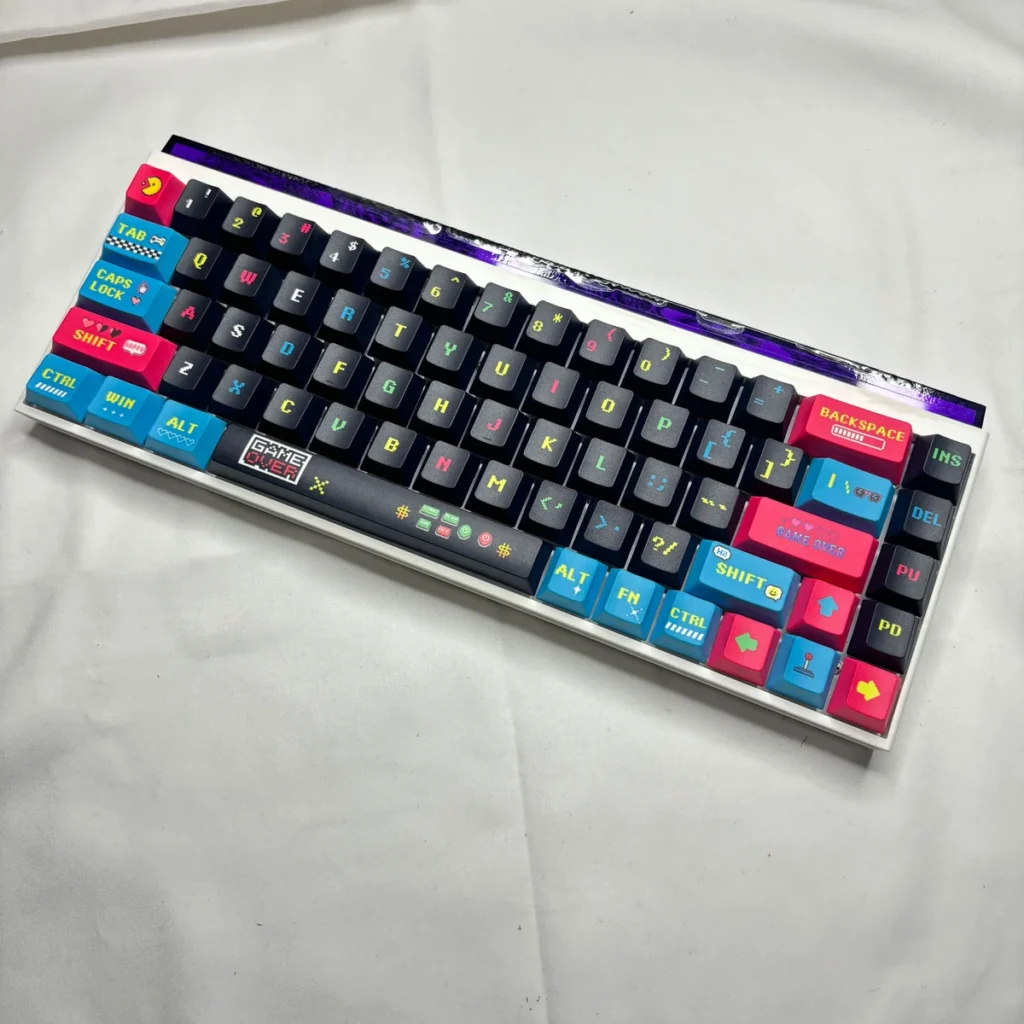 Packaging of the Pixel Video Games Keycap Set, presenting the full 74-key collection.