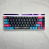 Pixel Video Games PBT Keycap Set on a mechanical keyboard, showcasing vibrant pixel art and side-lit legends.