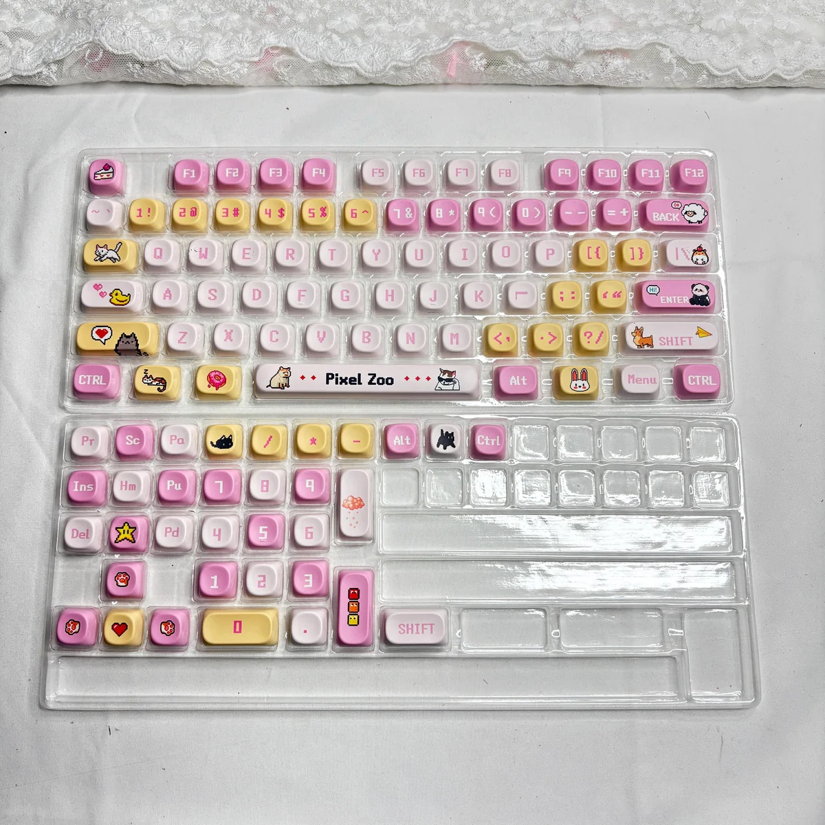 Pixel Zoo Keycap Set arranged as a group, displaying the full collection of unique pixelated creatures.