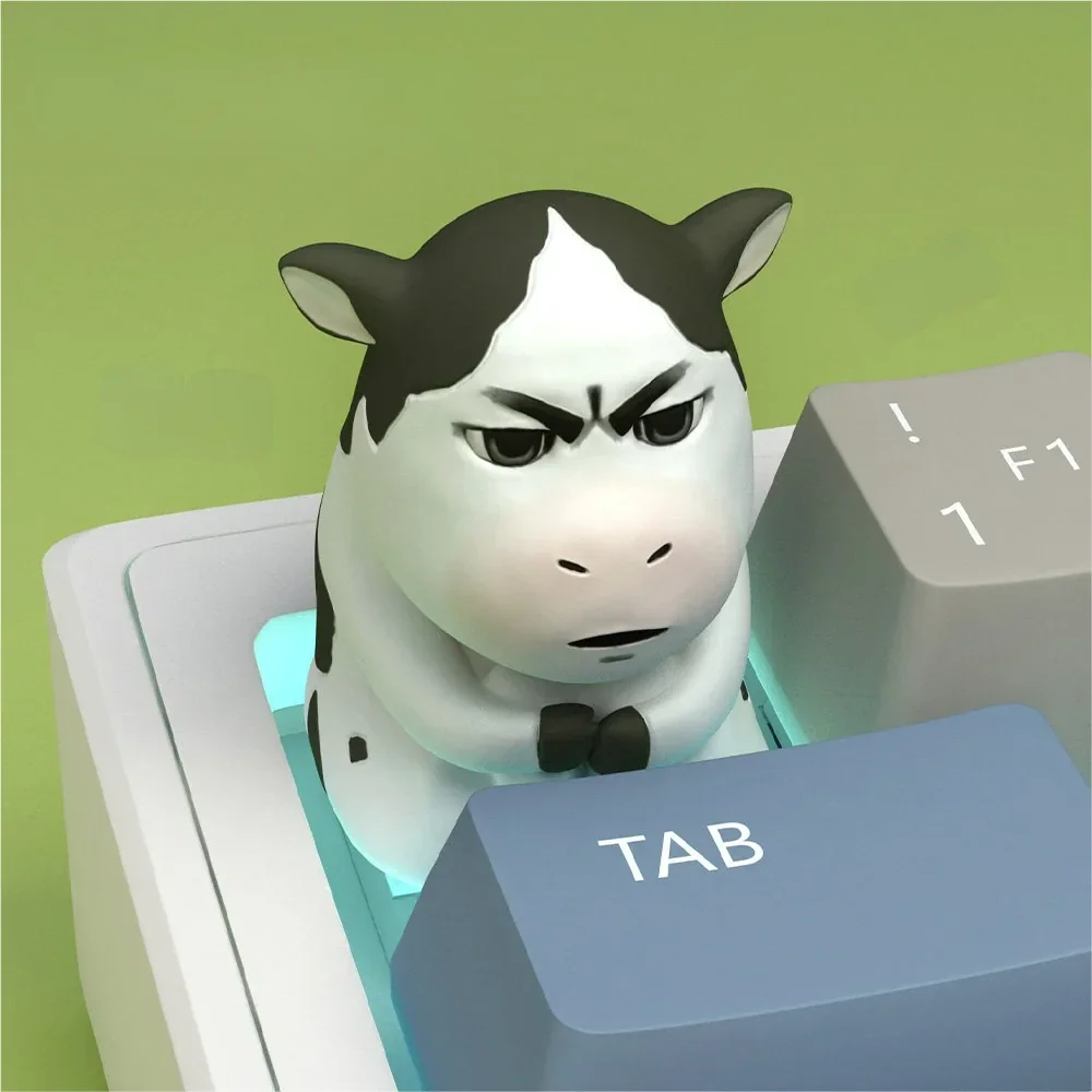 Niu Niu Cow Keycap from side, displaying resin texture