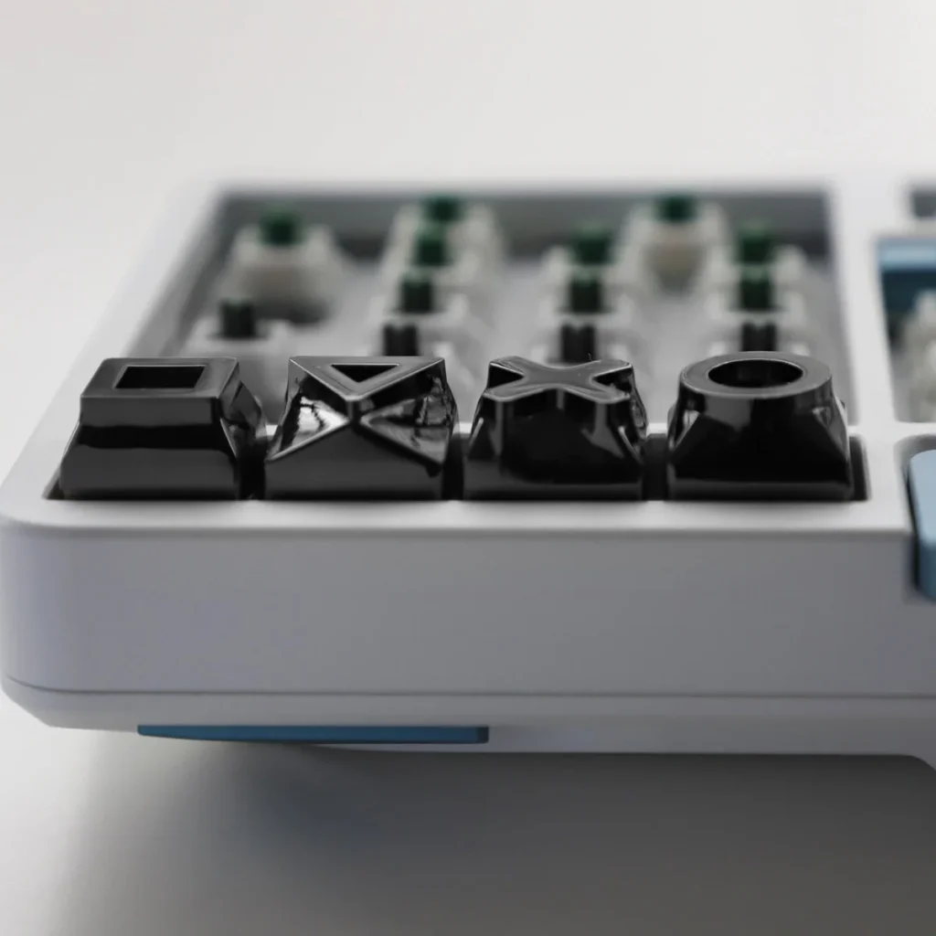 Detail shot of the alloy keycaps texture and the precision of their crafting.