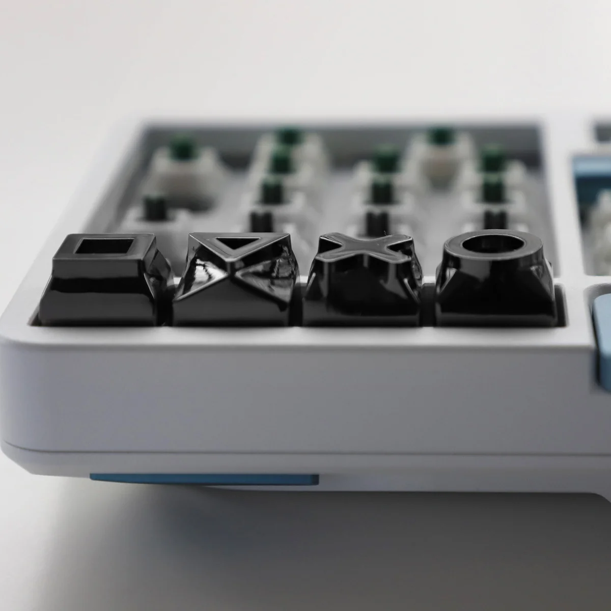 Detail shot of the alloy keycaps texture and the precision of their crafting.