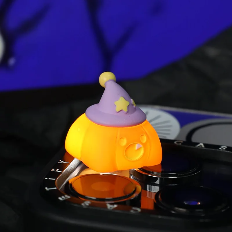 Close-up of handcrafted pumpkin keycap sculpt and resin finish