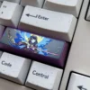 Top-down view of the Raiden Shogun Titanium Artisan Keycap, highlighting its regal design and metallic sheen