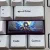 Raiden Shogun Titanium Keycap on a mechanical keyboard, close-up showing intricate details and anodized finish