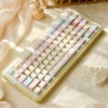 Romance Until Death PBT dye-sub keycap set on mechanical keyboard, showing pastel pink, blue, yellow keys.