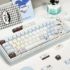 Sea Salt Choco Keycap Set installed on a compact mechanical keyboard in a serene desk setup