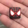 Handcrafted Spiderman artisan keycap made from vibrant resin, showcasing the iconic Marvel hero on a mechanical keyboard.