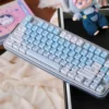 View of the underside of a Summer Kitty keycap, showing its robust PBT construction and MX-style stem compatibility