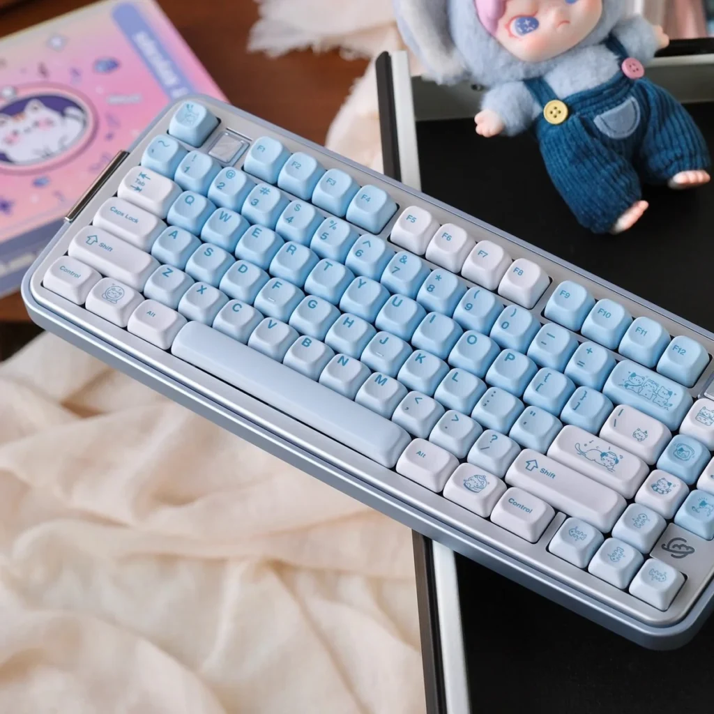 View of the underside of a Summer Kitty keycap, showing its robust PBT construction and MX-style stem compatibility