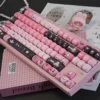 Close-up of black and pink bunny keycaps
