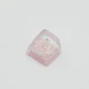 Top-down view of handcrafted Maltese Dog resin keycap