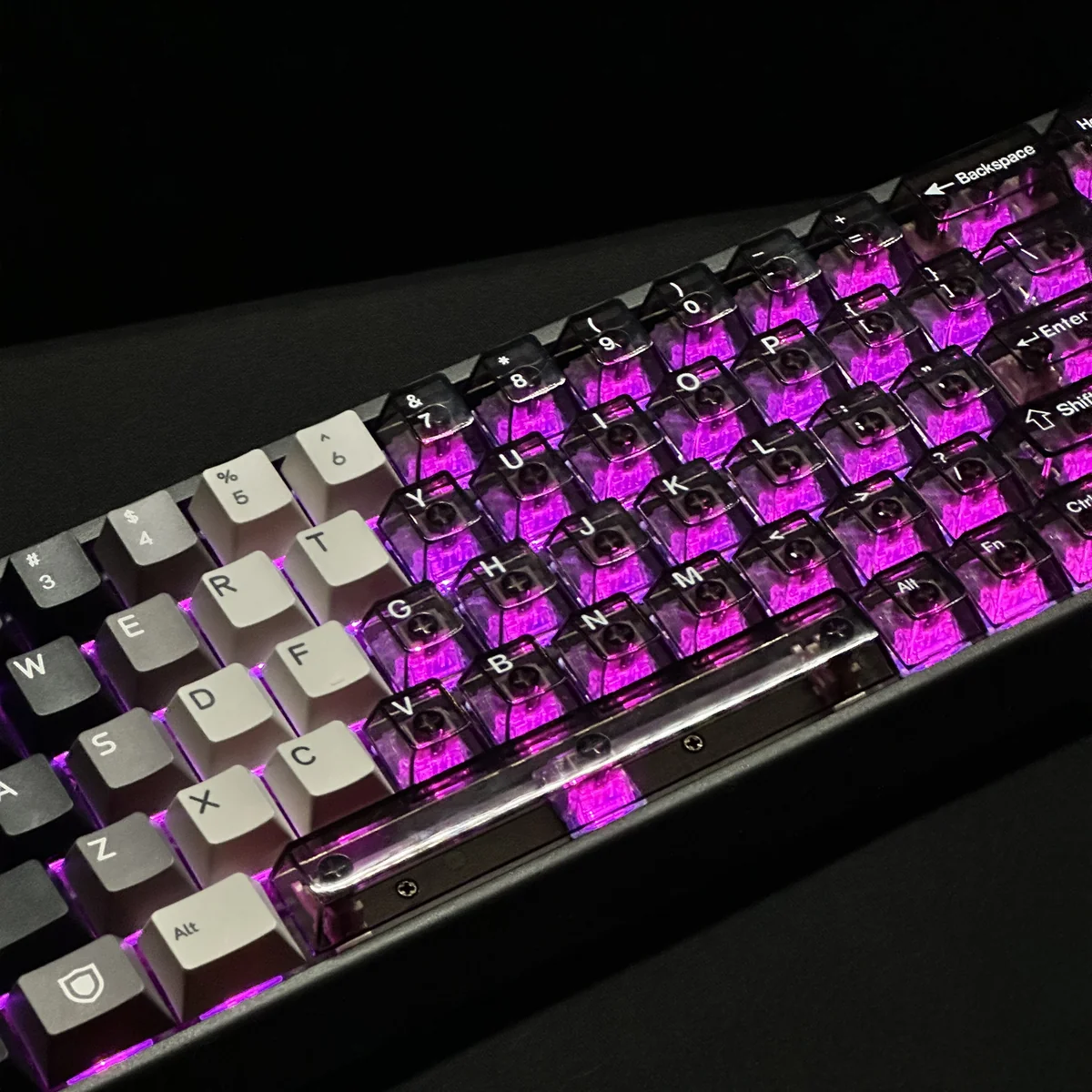 Translucent sections of Knight keycaps illuminating with RGB light