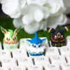 Close-up of Vaporeon 'cake' keycap showcasing pastel colors and resin details