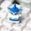 Handcrafted Vaporeon Cake Artisan Keycap on a mechanical keyboard