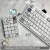 Close-up of Working Penguin keycaps highlighting detailed cartoon penguin illustrations and crisp dye-sublimation