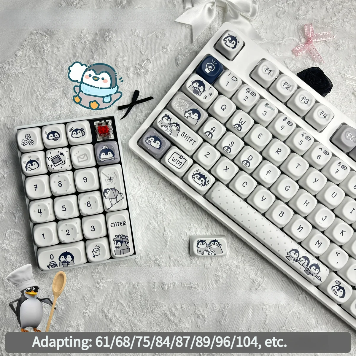 Close-up of Working Penguin keycaps highlighting detailed cartoon penguin illustrations and crisp dye-sublimation