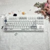 Working Penguin Keycap Set on a white mechanical keyboard, showcasing MOA profile and PBT dye-sub legends